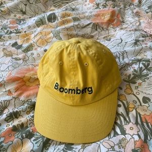 Bloomberg yellow baseball cap
